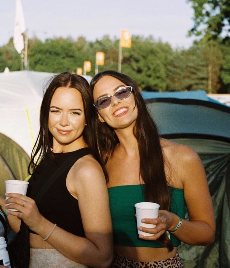sistertravels founders camping on a trip together