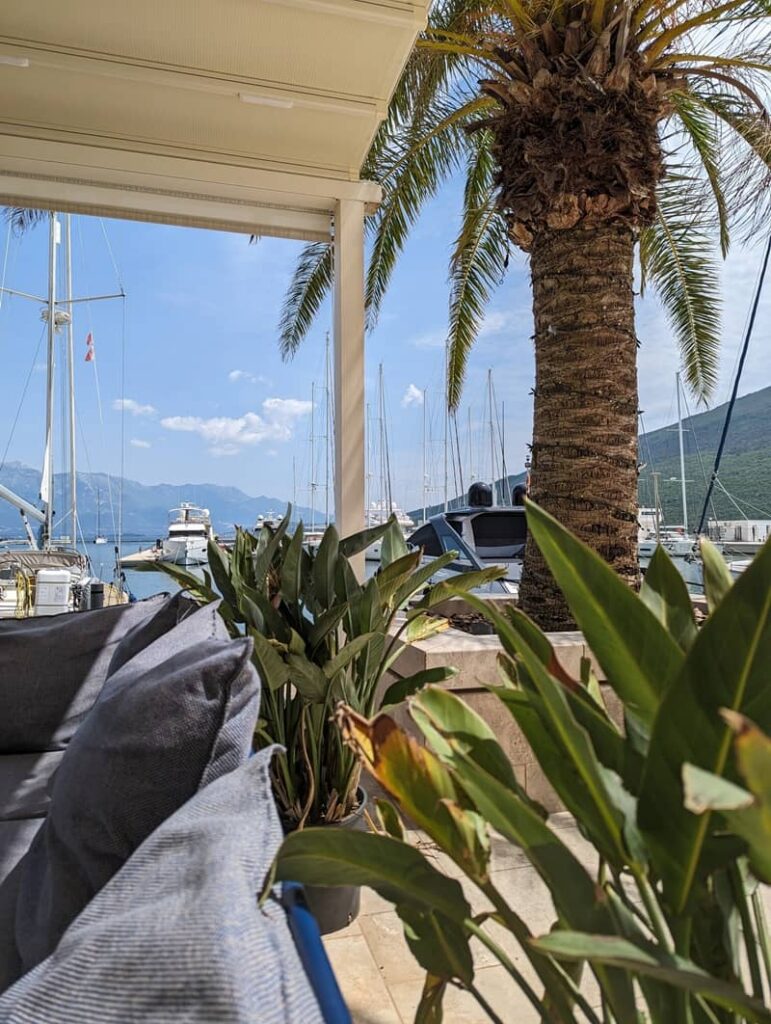 Scenic view of the Adriatic Sea and luxury yachts from a waterfront café, Koffein, in Portonovi, Montenegro