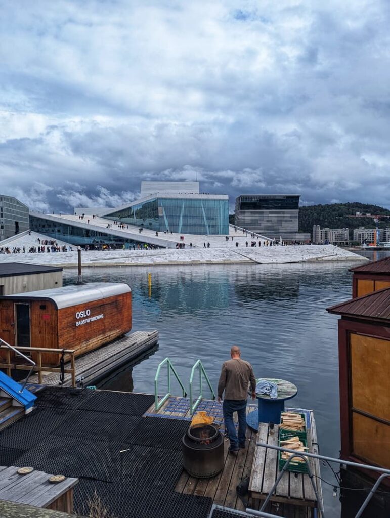 Nordic style scenic view of the Oslo Opera House from the KOK Oslo Badstuforening floating saunas, Norway.