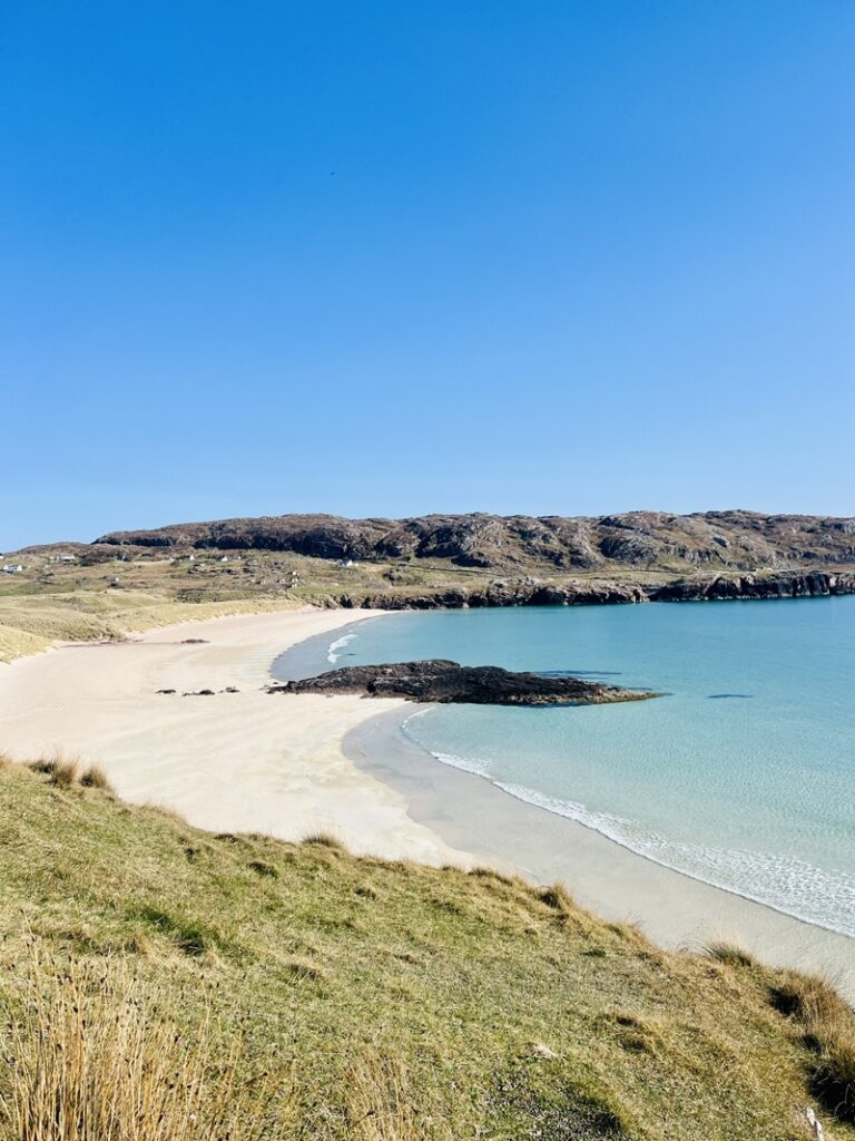 View of Oldshoremore beach in Scotland from the Headland